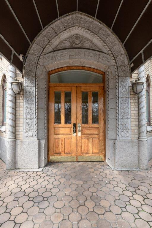 beautiful entryway with wooden doors